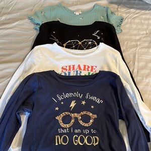 Set of 4 girls shirts. Size 14/16. 3 long sleeve and 1 short sleeve.